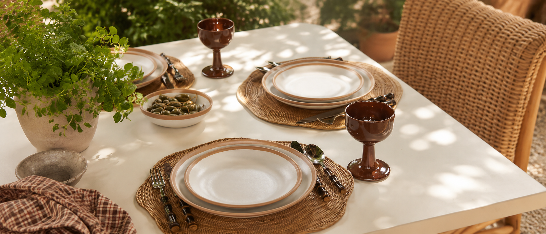 Ceramic tableware arranged in a refined dining setting